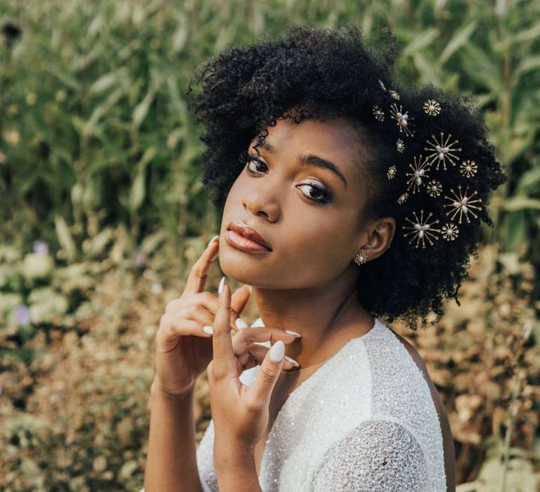 Black Bride with Afro Hair Wearing Several Gold Star Hair Clips