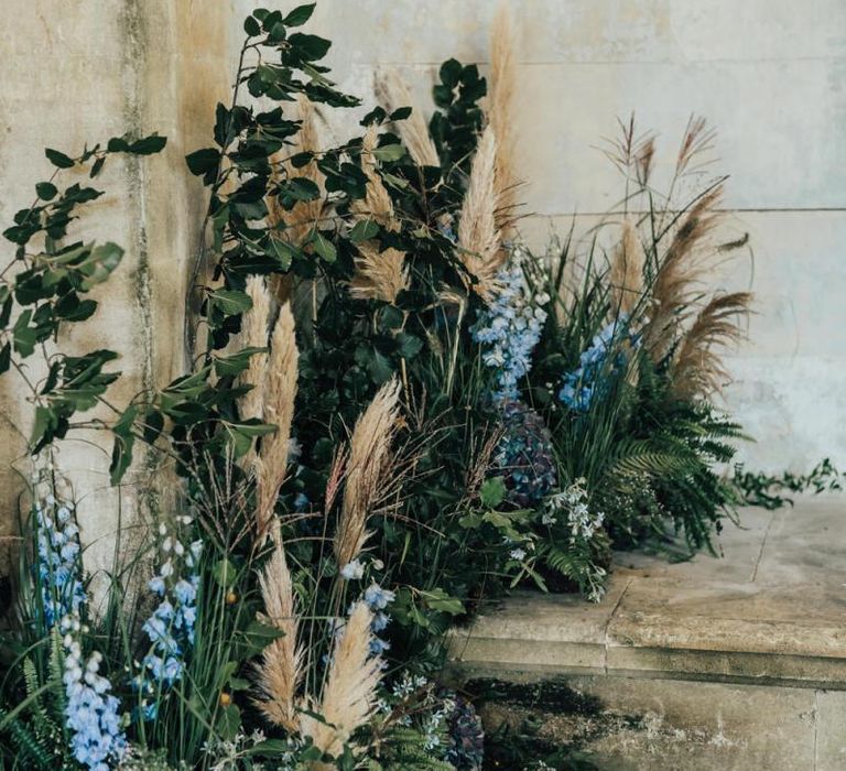 Wedding Floral Arrangement with Foliage, Blue Flowers and Pampas Grass