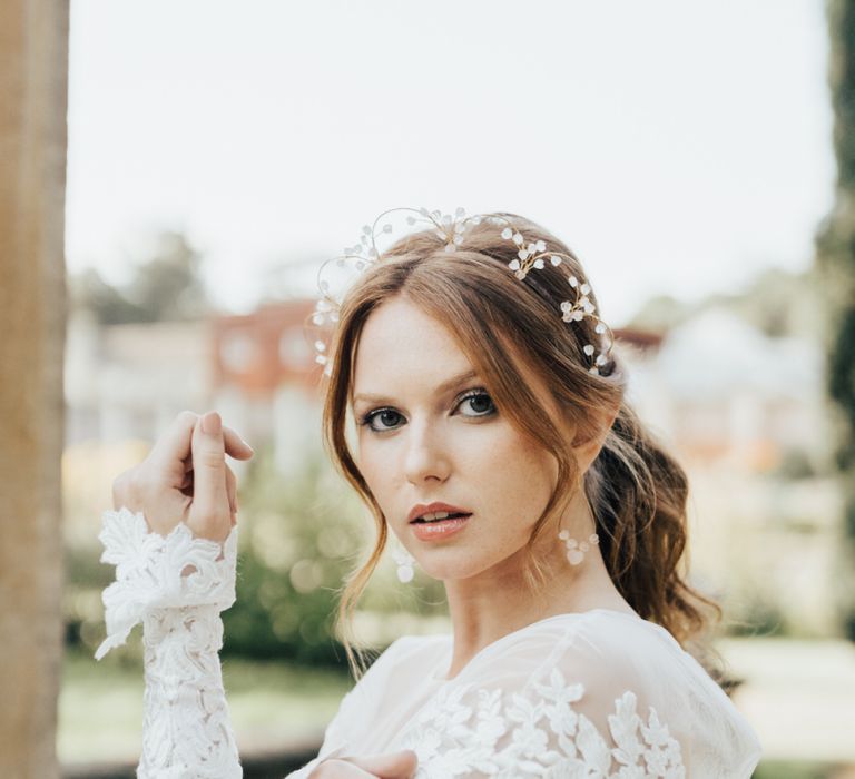 Bride with Swept Up Pony Tail Wearing a Delicate Stone Earring and Headdress Set