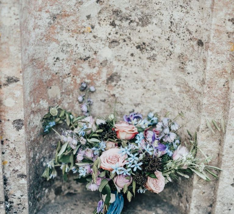 Beautiful Pastel Wedding Bouquet Tied with Blue Ribbon