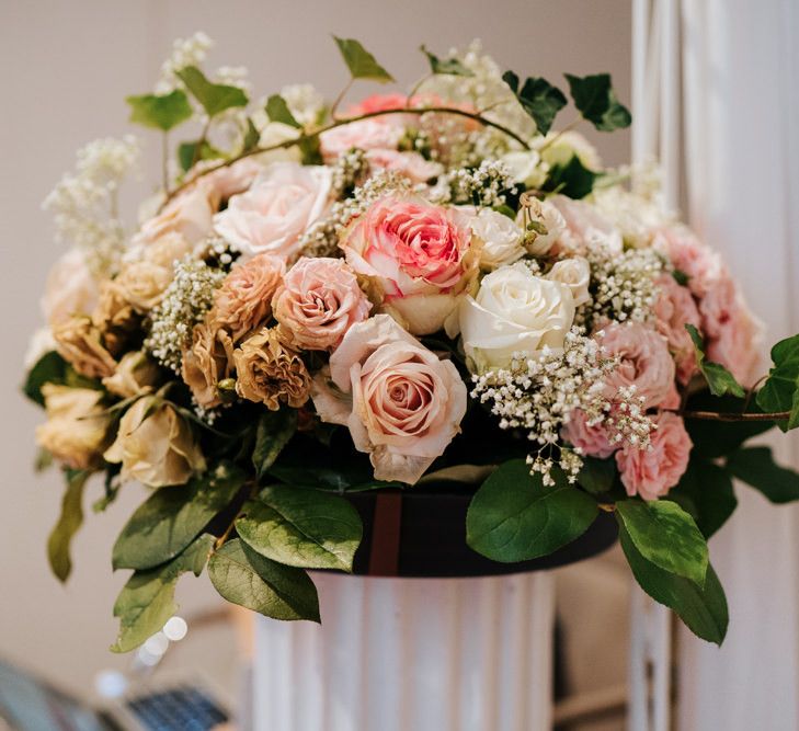 Pink and white rose floral arrangement at intimate Paris celebration