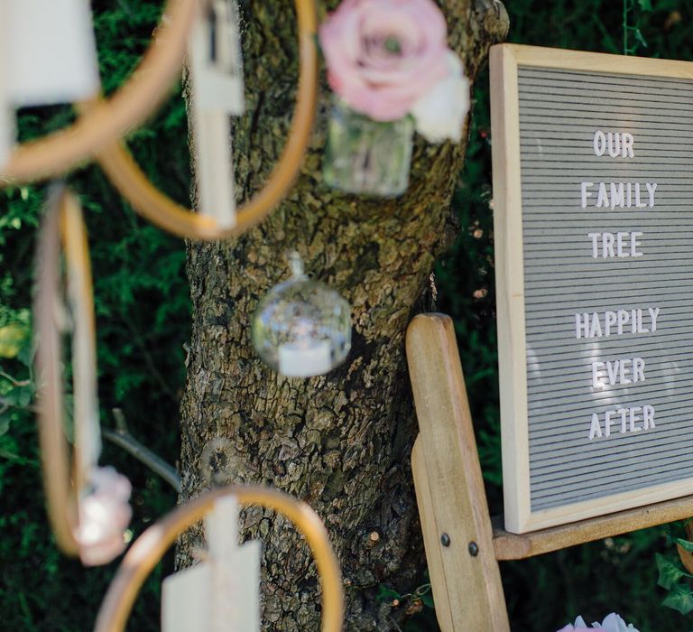 How to create a simple DIY Family Tree with wedding photos using embroidery hoops, ribbon, polaroid photos, mini pegs and flowers