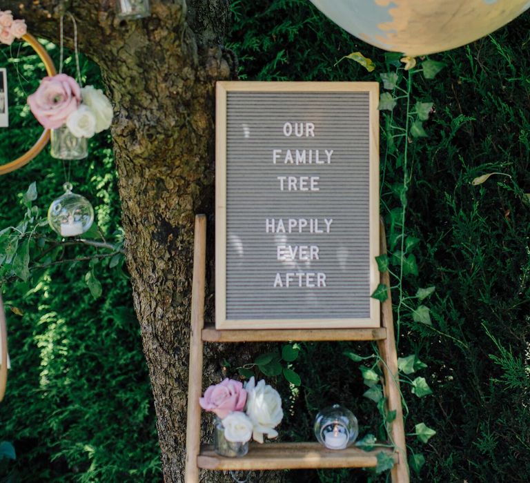 How to create a simple DIY Family Tree with wedding photos using embroidery hoops, ribbon, polaroid photos, mini pegs and flowers