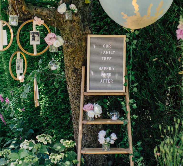 How to create a simple DIY Family Tree with wedding photos using embroidery hoops, ribbon, polaroid photos, mini pegs and flowers