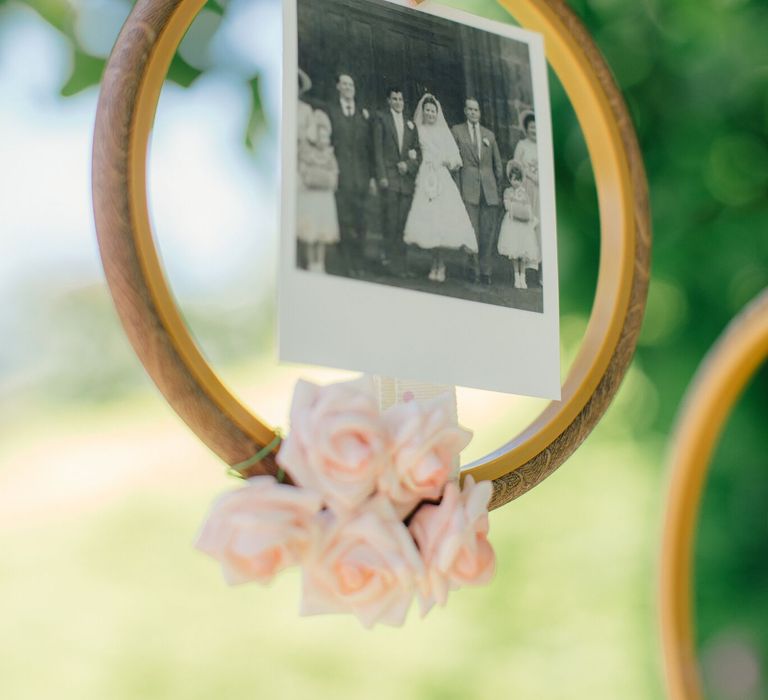 How to create a simple DIY Family Tree with wedding photos using embroidery hoops, ribbon, polaroid photos, mini pegs and flowers