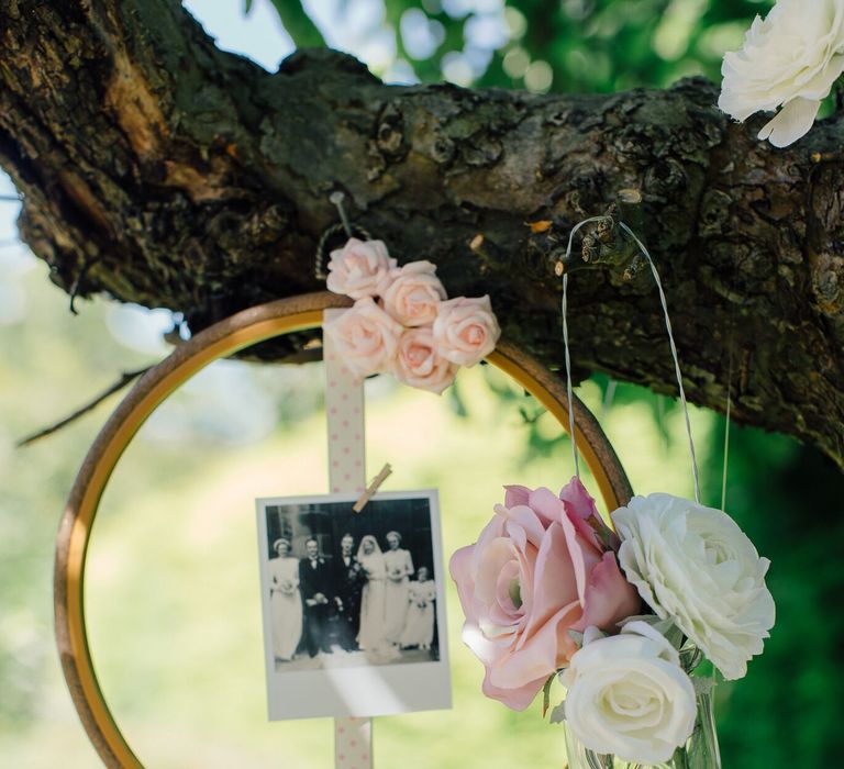 How to create a simple DIY Family Tree with wedding photos using embroidery hoops, ribbon, polaroid photos, mini pegs and flowers