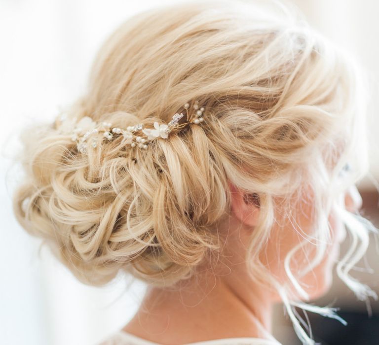 Pinned Bridal Up Do with Hair Vine