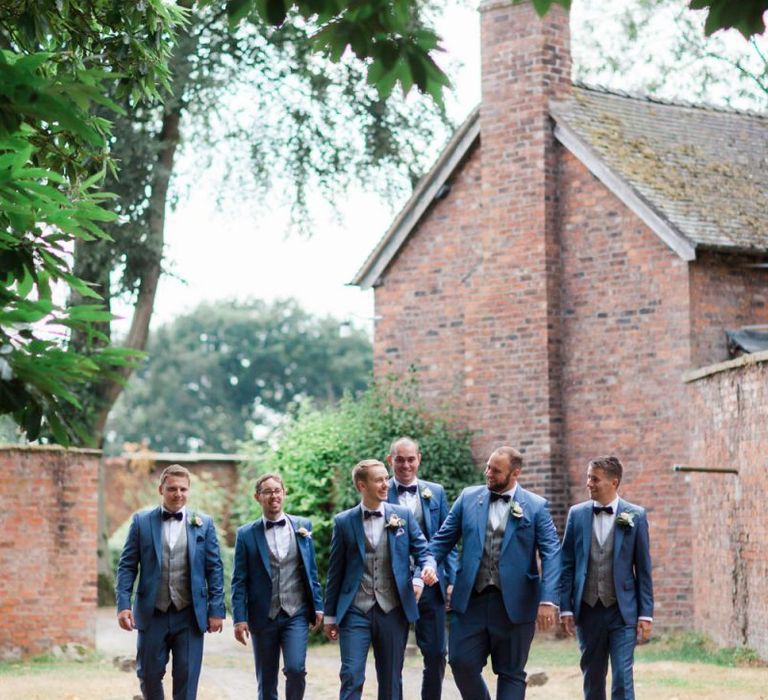 Groomsmen in Navy Suits with Grey Check Waistcoats