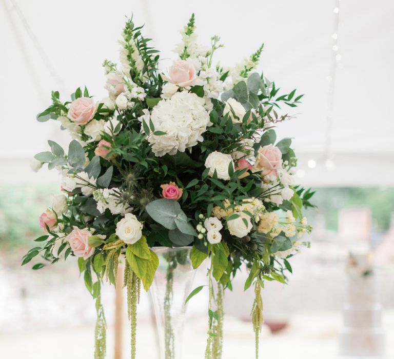 Tall Martini Glass Floral Centrepiece with Green White and Pink Flowers