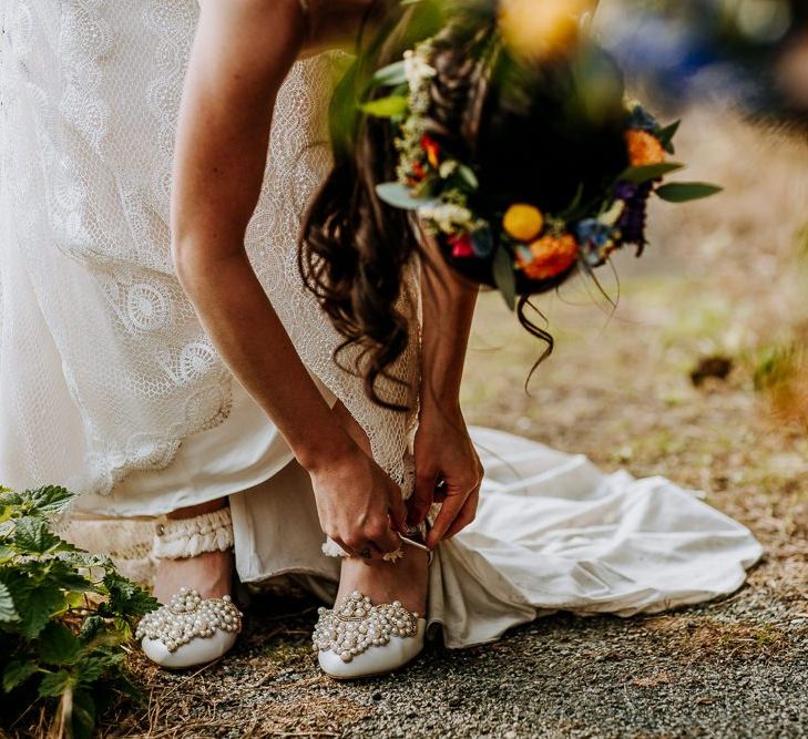 Bride in customised Wedding Shoes and  Sottero &amp; Midgley Wedding Dress