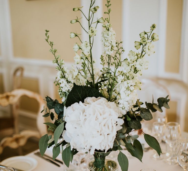 Green &amp; White Wedding Flower Centrepieces | Green, White &amp; Gold Wedding at Buckland Tout Saints, Devon |  Darina Stoda Photography