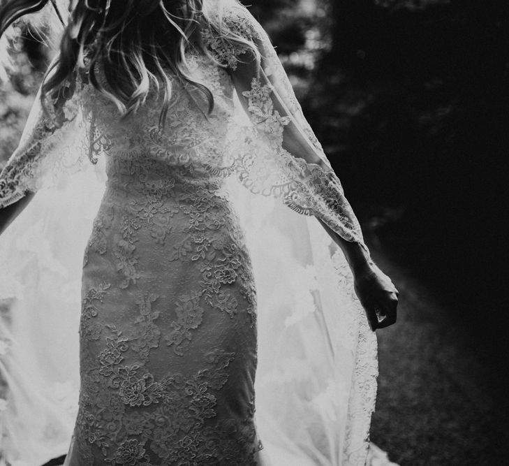 Bride in Pronovias Oringo Lace Bridal Gown &amp; Cape | Green, White &amp; Gold Wedding at Buckland Tout Saints, Devon |  Darina Stoda Photography