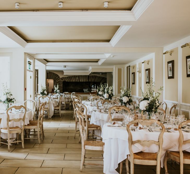 Wedding Reception | Green, White &amp; Gold Wedding at Buckland Tout Saints, Devon |  Darina Stoda Photography