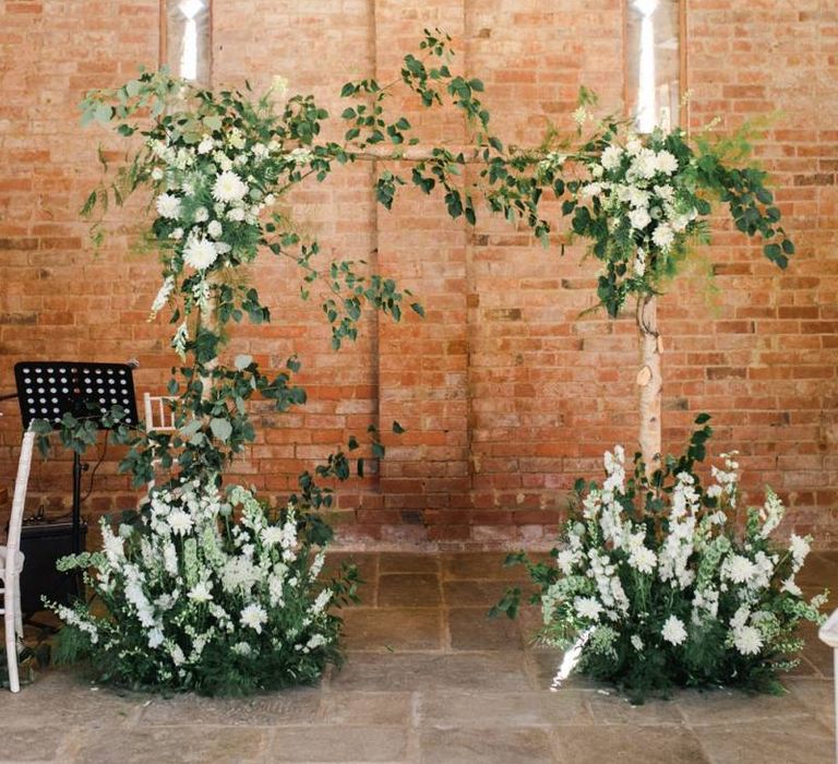 White wedding flowers for ceremony decor