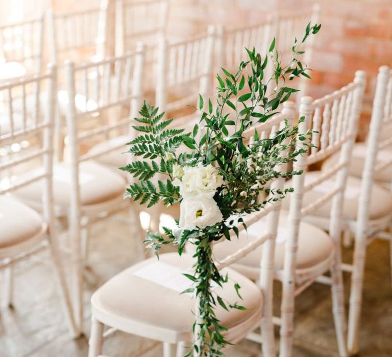 White wedding flowers chair back decor