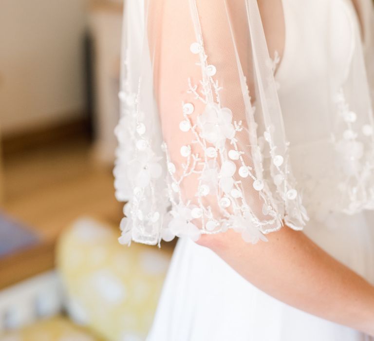 Lace detail on bridal cover-up