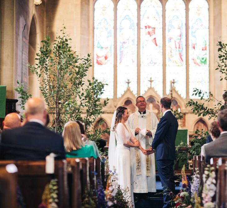 Church wedding ceremony with tree decor