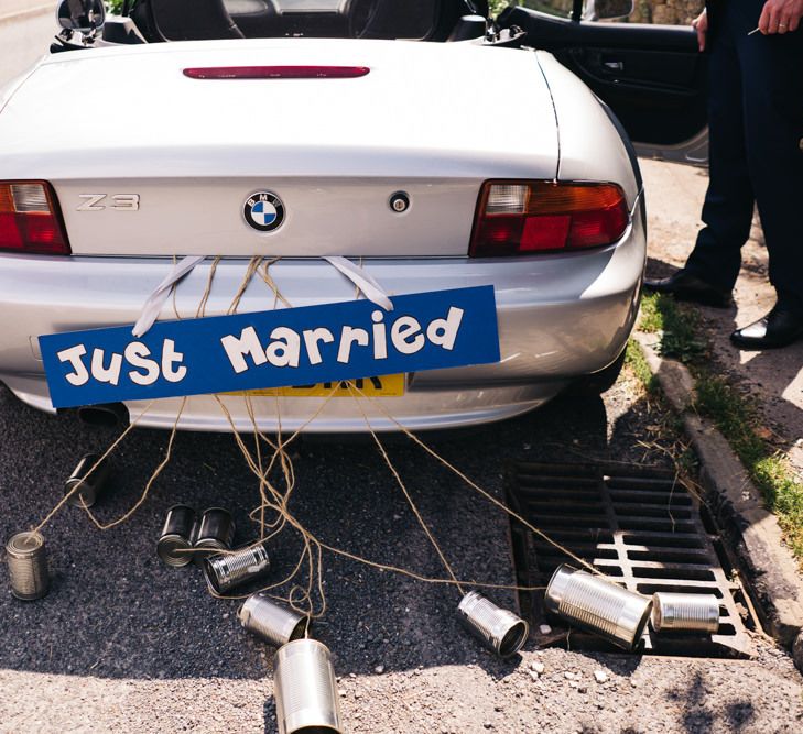 Just married sign on wedding transport