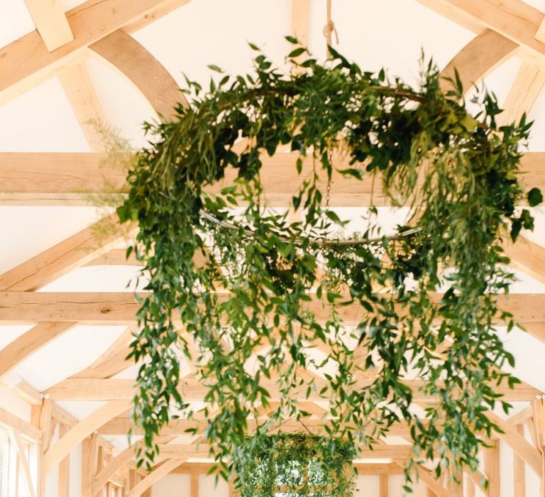 Foliage chandelier at wedding breakfast