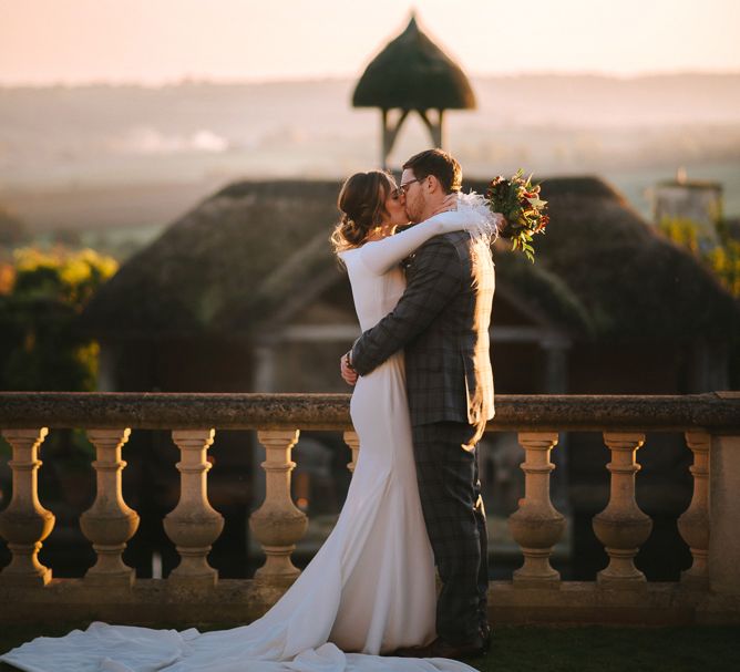 Sunset Wedding Portrait of Bride and Groom Embracing