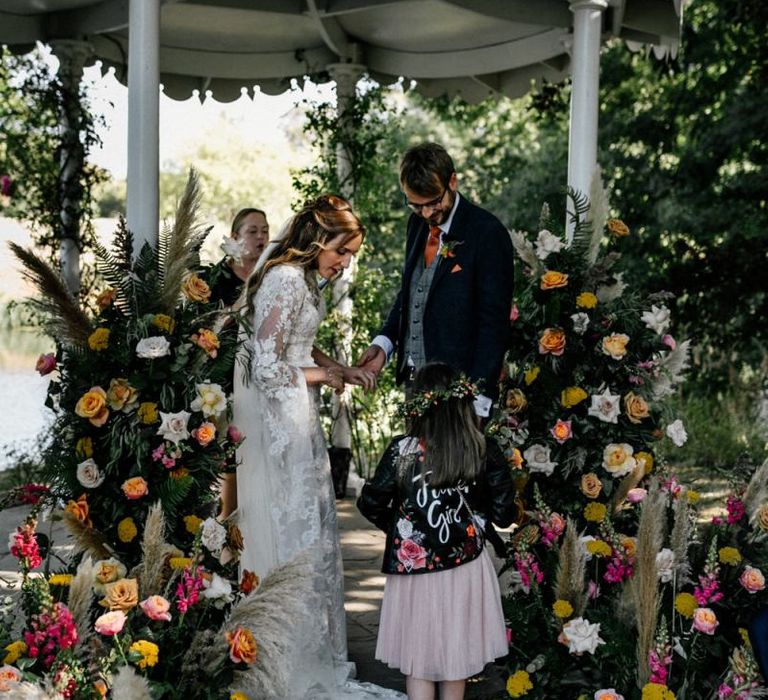 Flower girl in customised leather jacket and pink tulle skirt