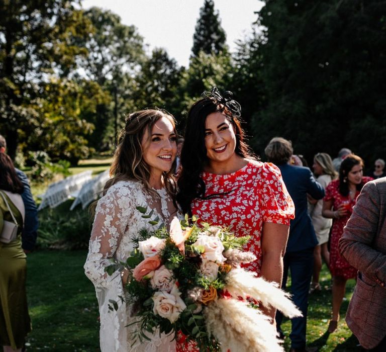 Bride and wedding guest portrait