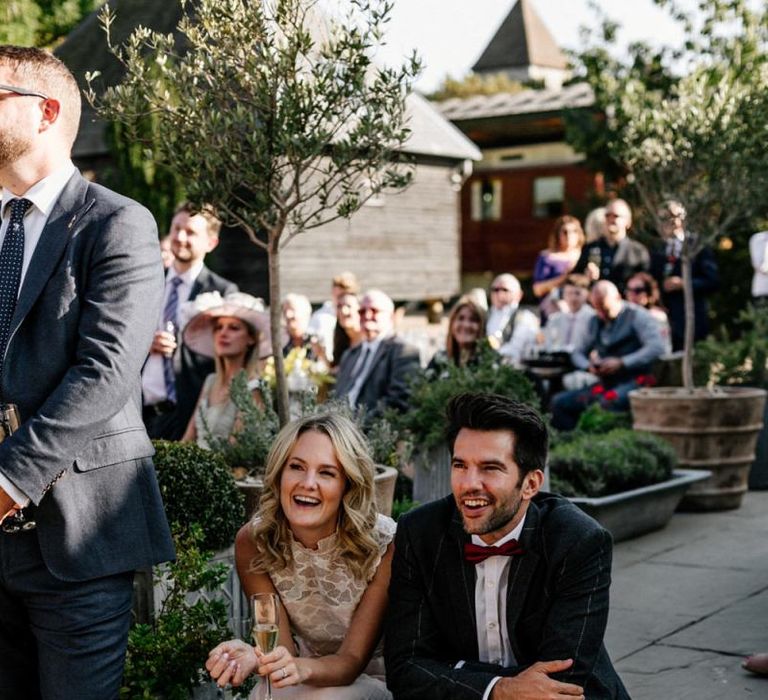 Wedding guests enjoying the speeches at Preston Court