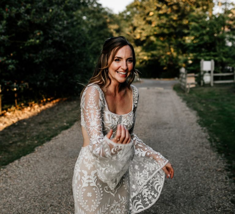 Boho bride in lace wedding dress