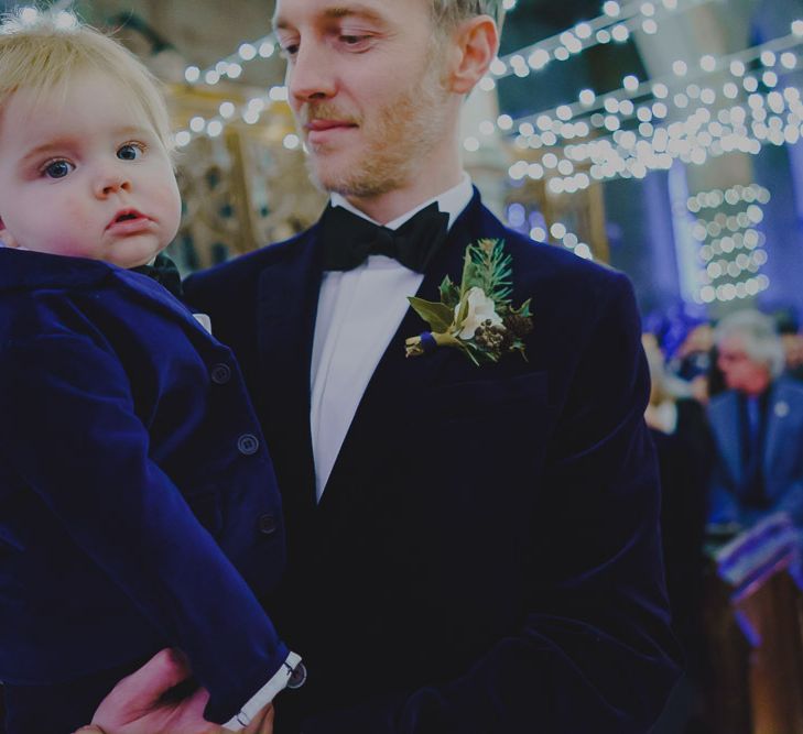 Groom and son at the altar in velvet dinner jackets