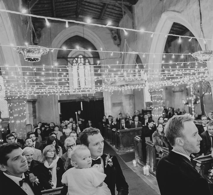 Church wedding with fairy light decor