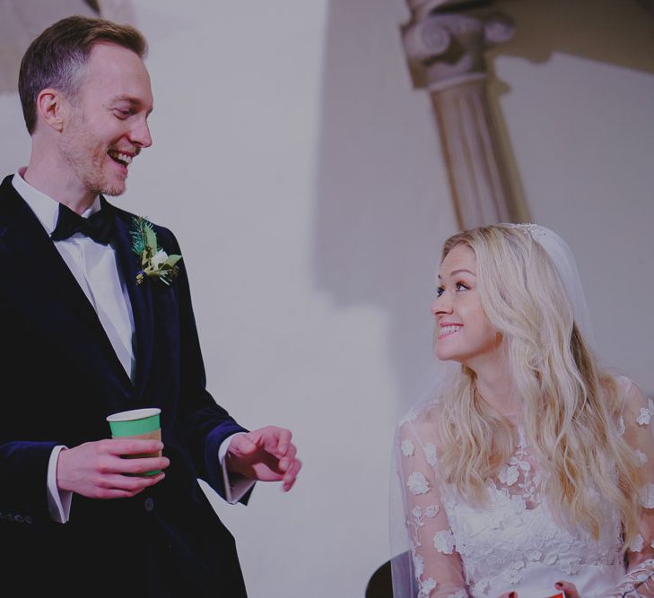 Bride and groom exchanging vows at winter wedding