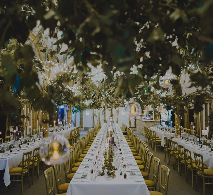 Wedding reception at South Farm with foliage and fairy lights