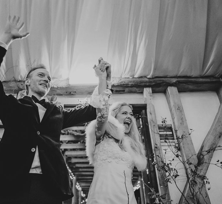 Bride and groom entering the wedding reception at South Farm