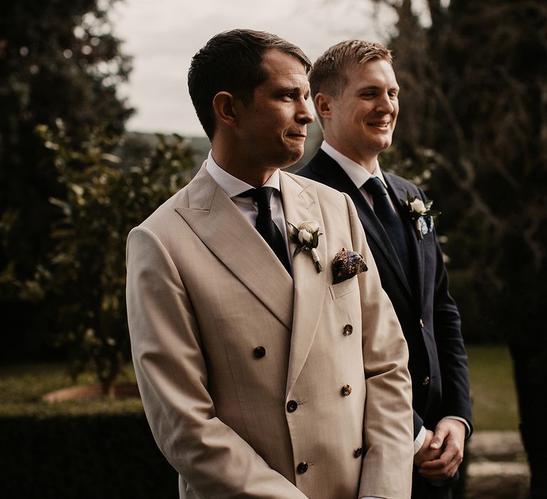 Groom in cream dinner jacket for Italian wedding