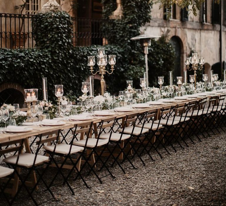 Wedding table decor with flowers and candles