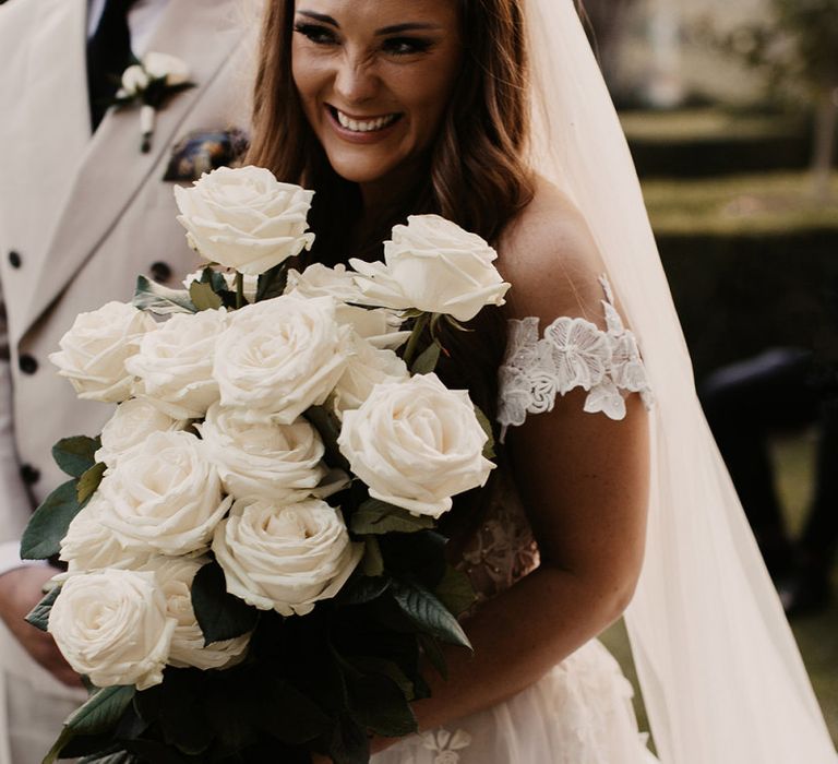 White rose wedding bouquet with Galia Lahav bride dress