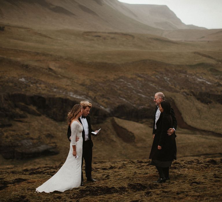 Iceland Elopement Wedding // Bride In Sequin Suzanne Harward Dress // Images By James Frost Photography // Personalised Wedding Vows