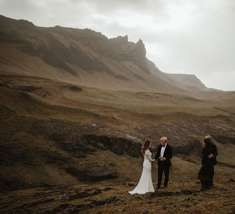 Iceland Elopement Wedding // Bride In Sequin Suzanne Harward Dress // Images By James Frost Photography // Personalised Wedding Vows