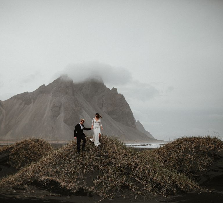 Iceland Elopement Wedding // Bride In Sequin Suzanne Harward Dress // Images By James Frost Photography // Personalised Wedding Vows