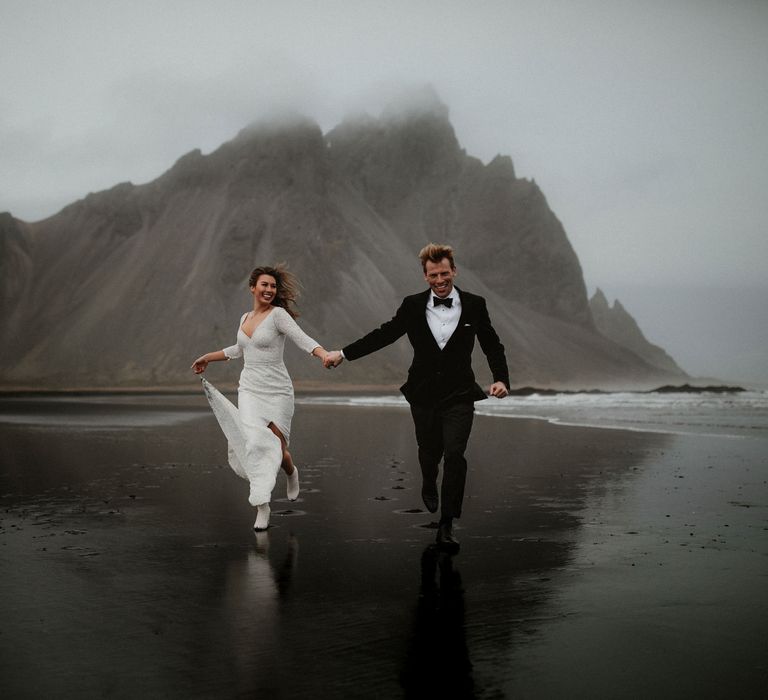 Iceland Elopement Wedding // Bride In Sequin Suzanne Harward Dress // Images By James Frost Photography // Personalised Wedding Vows