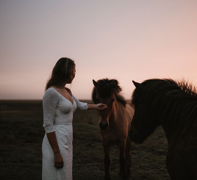 Iceland Elopement Wedding // Bride In Sequin Suzanne Harward Dress // Images By James Frost Photography // Personalised Wedding Vows