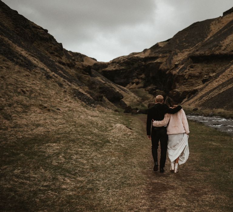 Iceland Elopement Wedding // Bride In Sequin Suzanne Harward Dress // Images By James Frost Photography // Personalised Wedding Vows