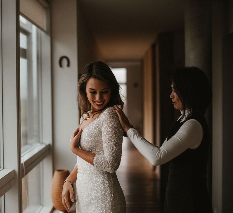 Iceland Elopement Wedding // Bride In Sequin Suzanne Harward Dress // Images By James Frost Photography // Personalised Wedding Vows