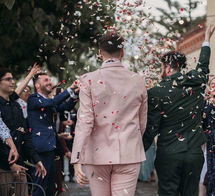 Confetti Moment with Groom in Pink Wedding Suit and Green Wedding Suit