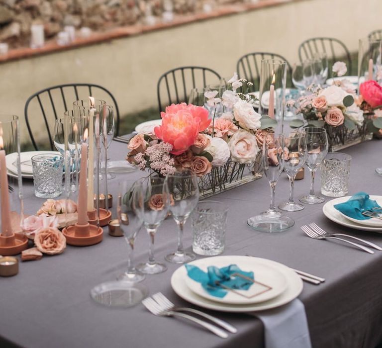 Coral Wedding Flower Centrepieces and Candle Light