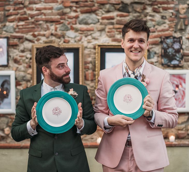 Grooms Holding Hand Painted Plates