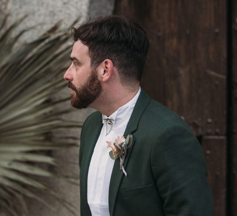 Groom in Forest Green Wedding Suit and Grandad Shirt