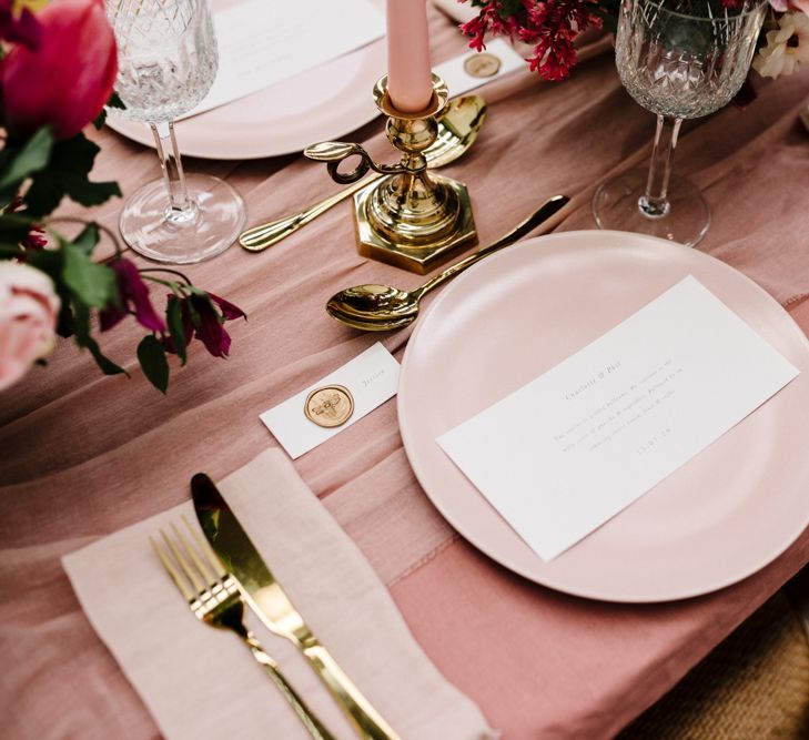 Elegant Place Setting with Pink Tableware and Gold  Cutlery