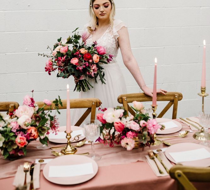 Beautiful Bride holding an Oversized Deep Pink and Green Wedding Bouquet