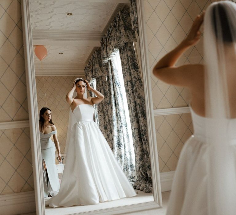 Bride In Strapless Wedding Dress From Halfpenny London